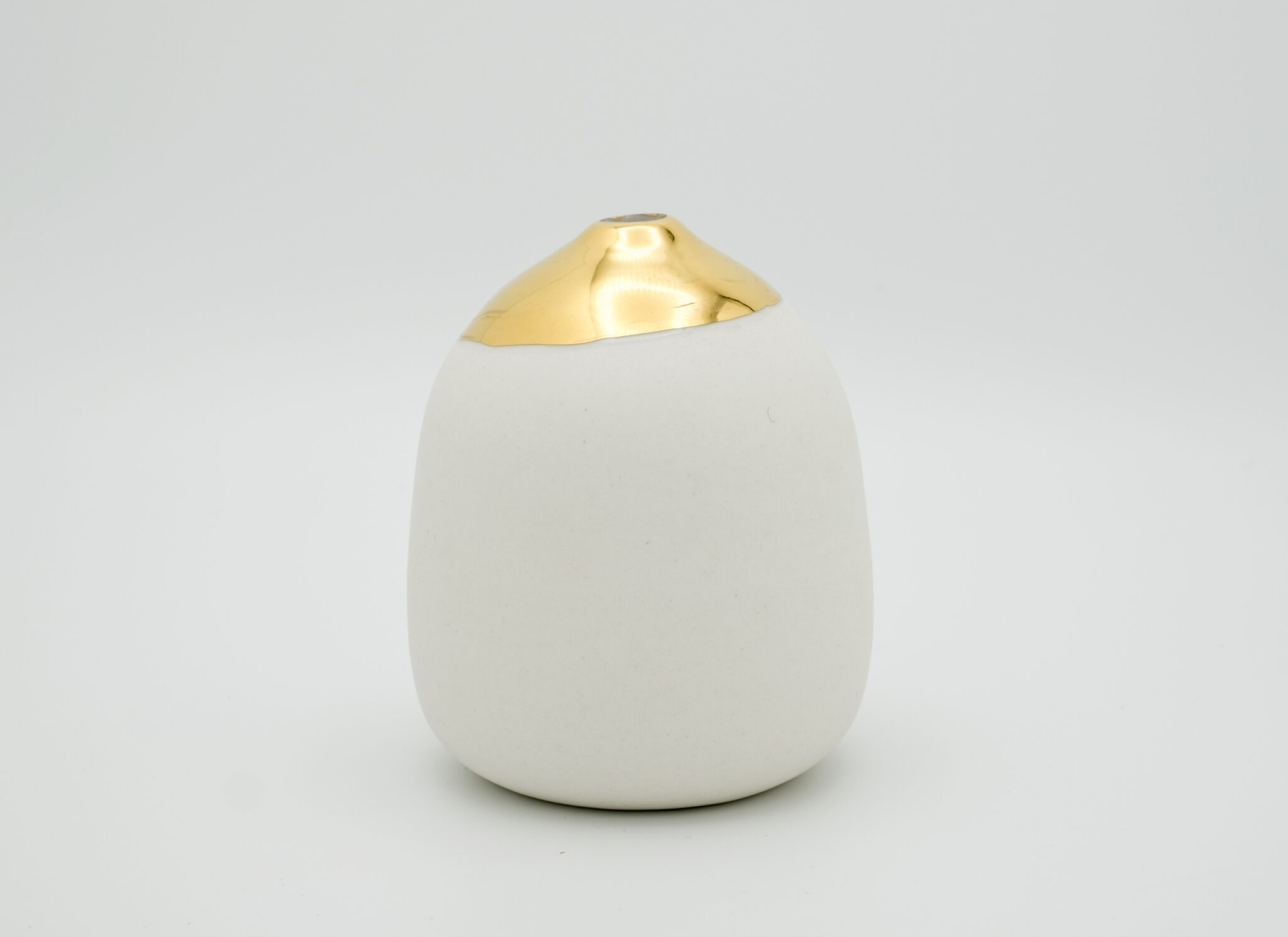 wheel thrown porcelain vase gold